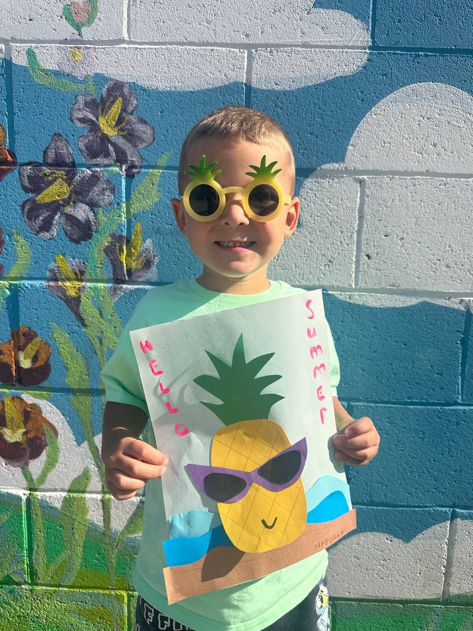 A “Hello Summer” pineapple collage