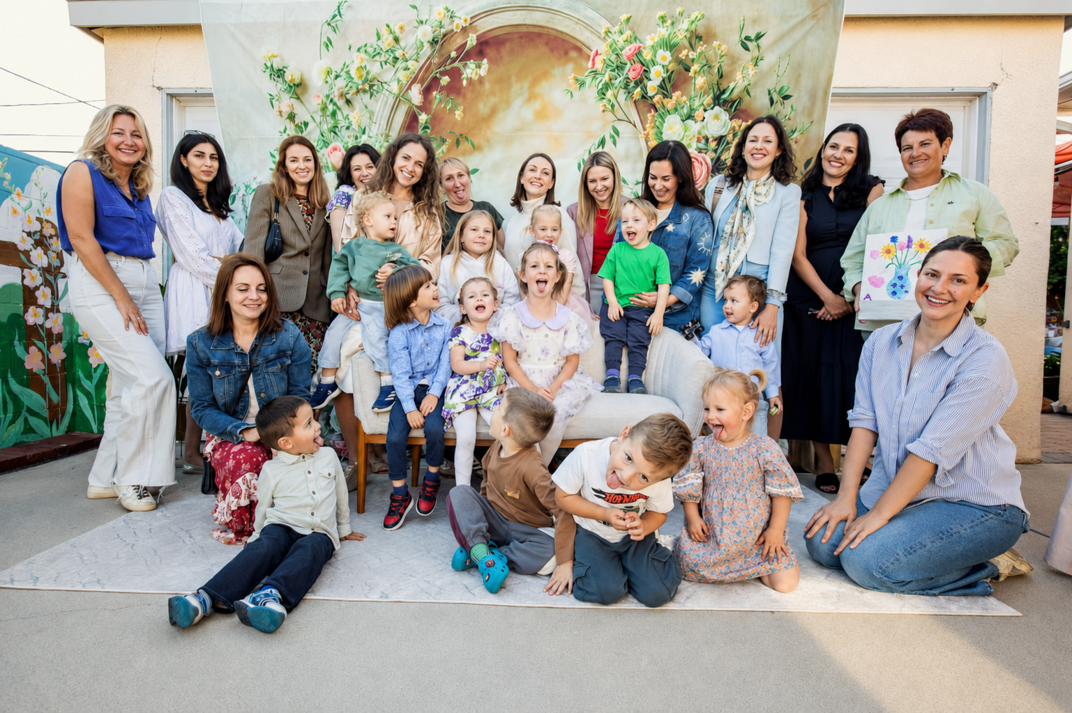 Little Birds LA families and children together in the flower-filled backyard