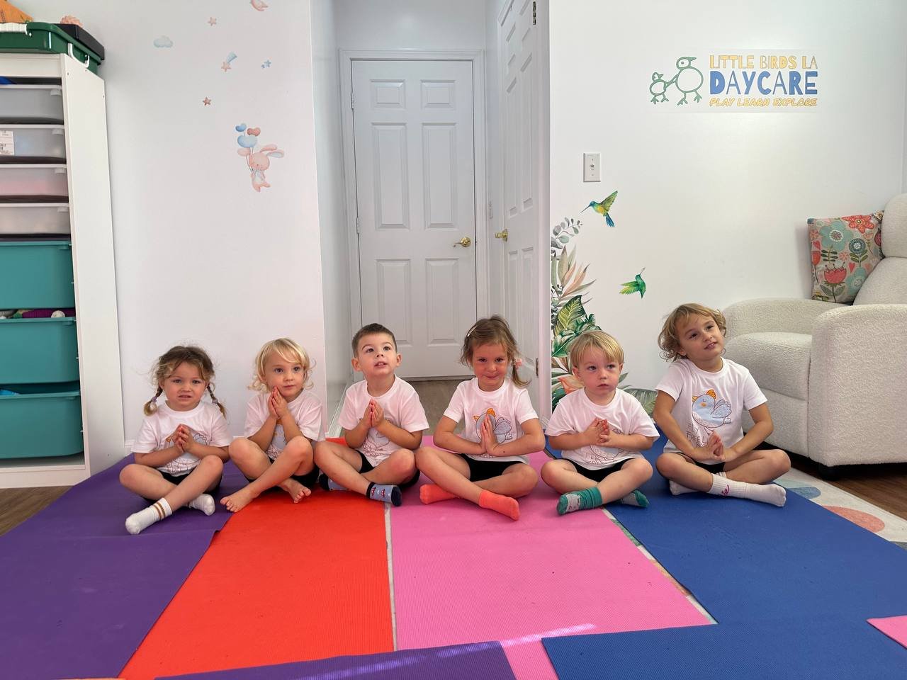 A calm seated pose on the mats
